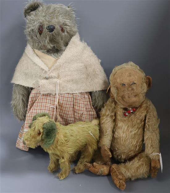 Aunt Lucy, no hat or glasses, missing one shoe; Merrythought chimp, registered label worn and an early English 1930s dog, good conditi
